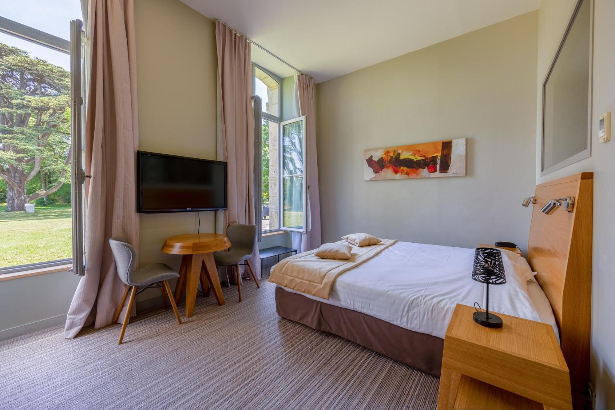 Hotel Et Spa Du Chateau Lagord Værelse billede